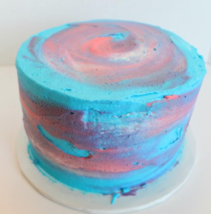 Smoothing the watercolor cake