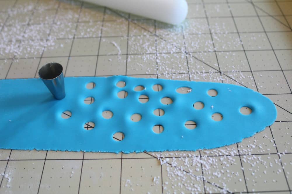 Rolling out fondant for edible confetti